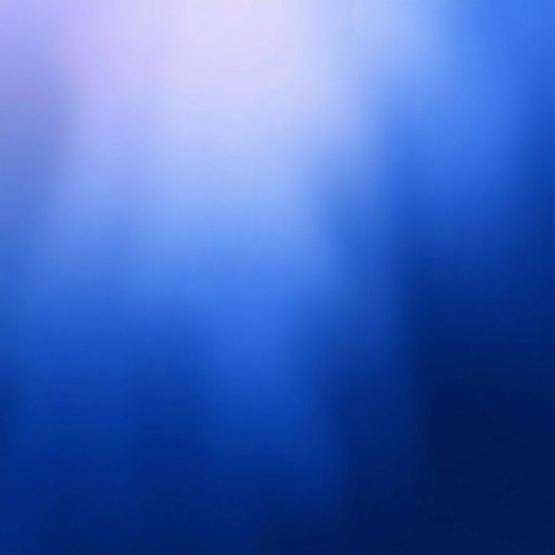 Abstract indigo gradient evoking a financial data grid